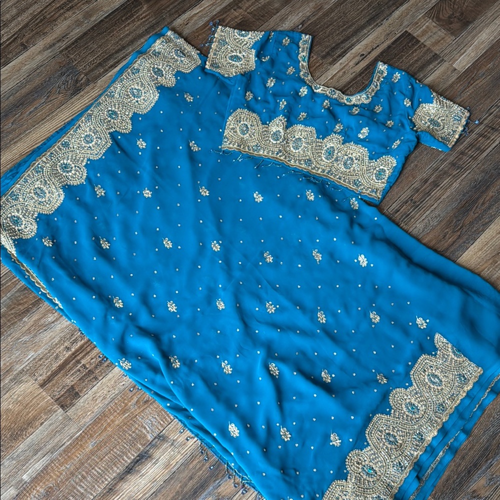 Elegant Blue and Gold Embellished Dress